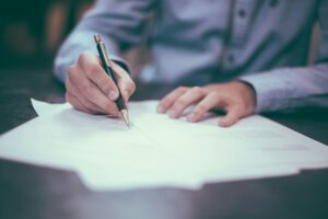 Permission letter samples displayed with professional paperwork on a desk