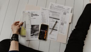 Warning letter samples represented by professional business documents on a desk
